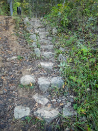 Rock stairs, trail beside