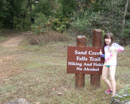 At the Trailhead. It's cold enough to wear a long sleeve shirt but warm enough to swim.