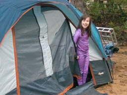 Long John girl emerges from the tent. It was cold last night but we had lots of bedding.