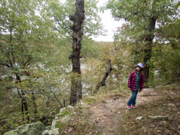 Girl with sucker on the Lake Trail.