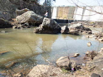 Jeralyn casting below the dam.